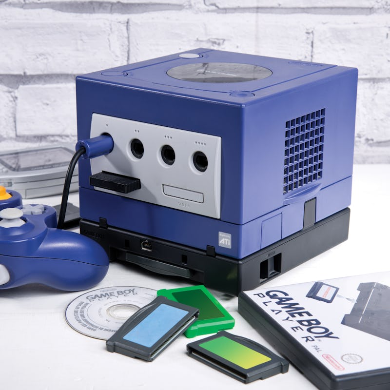 A Nintendo GameCube home video games console fitted with a Game Boy Player accessory, taken on April...