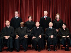 Seated from left: Associate Justice Samuel Alito, Associate Justice Clarence Thomas, Chief Justice J...