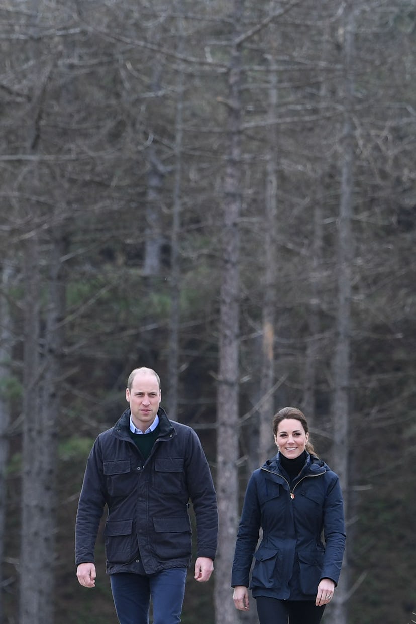 Prince William and Kate Middleton in similar looking jackets for a beach walk.