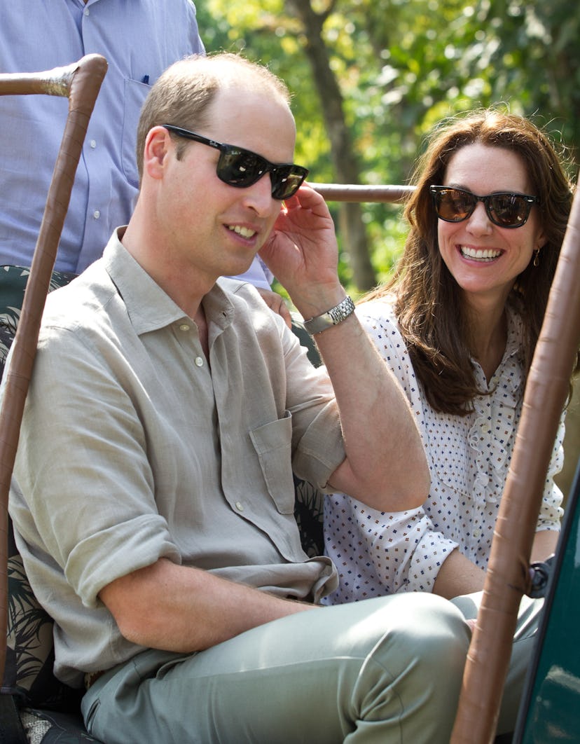 Prince William and Kate Middleton wearing matching sunglasses.