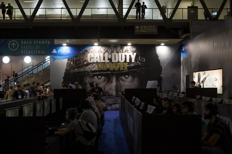 MILAN, ITALY - SEPTEMBER 29: Gamers play Call of Duty: WWII at the Activion's stand during the Milan...