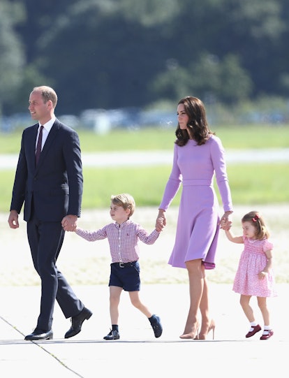 Prince William, Kate Middleton, Prince George and Princess Charlotte in coordinating pink and purple...