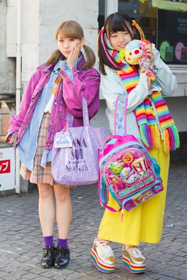 Umo (left) and Kanpei (right) stop for a quick fashion snap on Harajuku on December 03, 2017 in Toky...