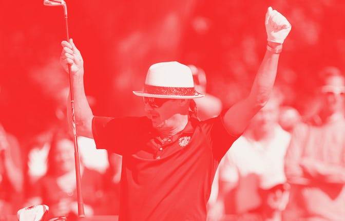 Michigan native musician Kid Rock celebrates his shot from the 13th fairway during the celebrity sho...