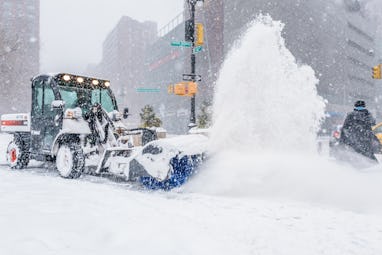 UNIONSQUARE, NEW YORK, UNITED STATES - 2018/01/04: Snow ploughs at work in the streets. Bomb cyclone...