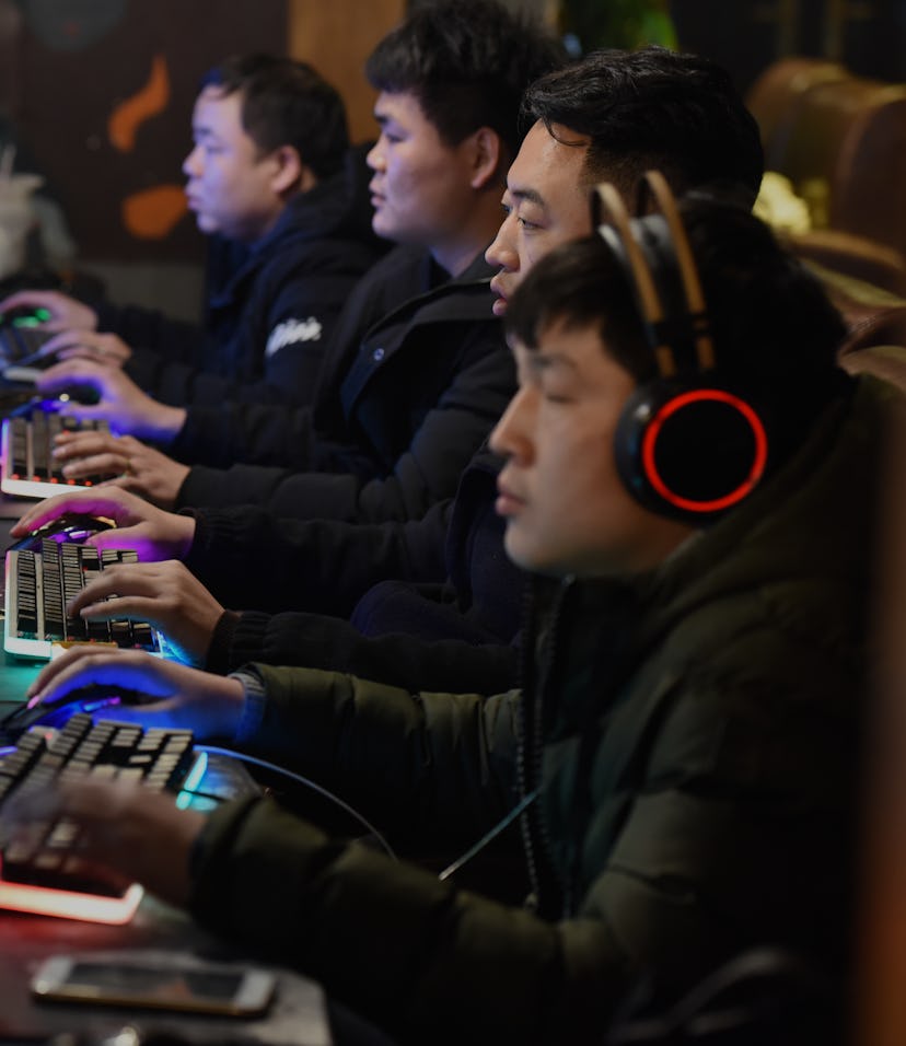 FUYANG, CHINA - MARCH 01: People play computer games at an Internet Cafe on March 1, 2019 in Fuyang,...