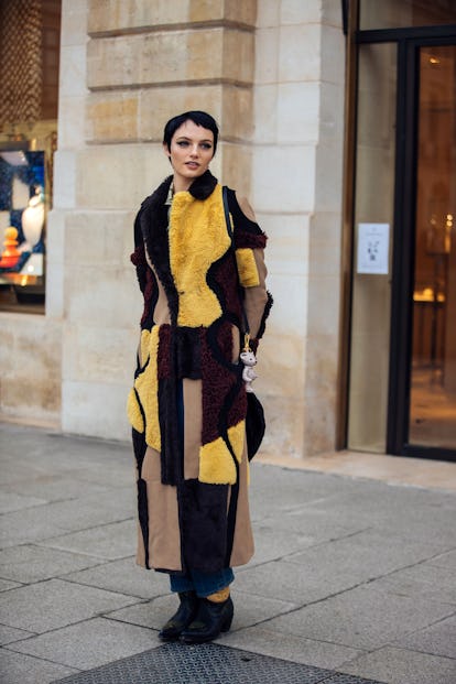 PARIS, FRANCE - JANUARY 26: Model Fran Summers wears yellow, red, brown, and tan multi-panel Kiko Ko...
