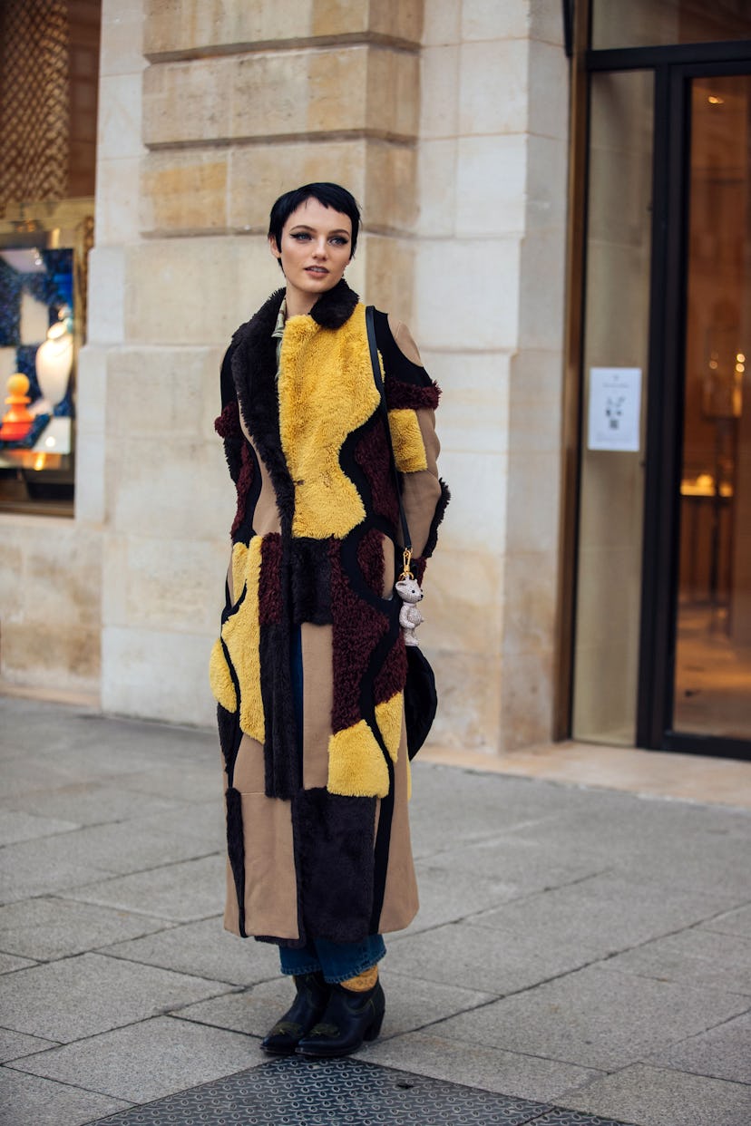 PARIS, FRANCE - JANUARY 26: Model Fran Summers wears yellow, red, brown, and tan multi-panel Kiko Ko...