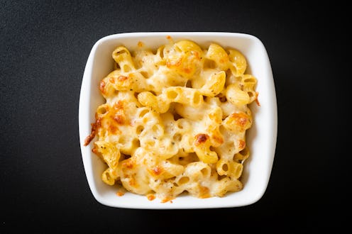 mac and cheese, macaroni pasta in cheesy sauce - American style