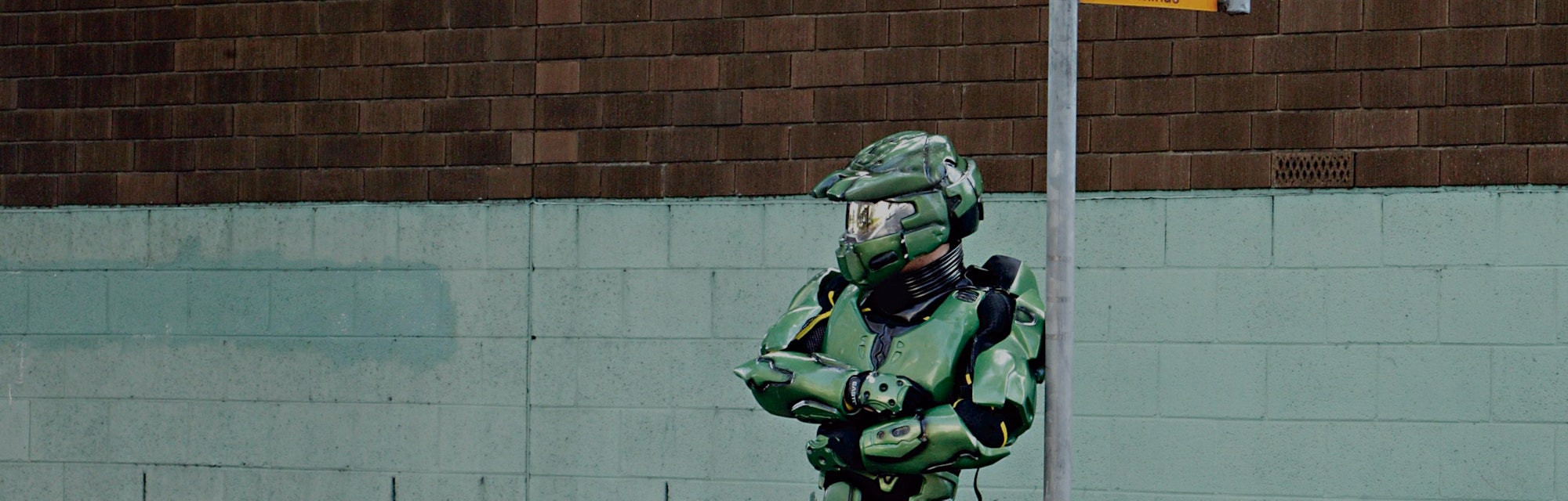 (AUSTRALIA OUT) Alexandria, Halo 2 computer game character Master Chief at a bus stop, 26 April 2005...