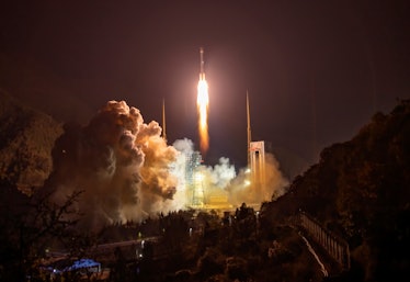 XICHANG, CHINA - DECEMBER 30: A Long March 3B carrier rocket carrying an experimental satellite, nam...