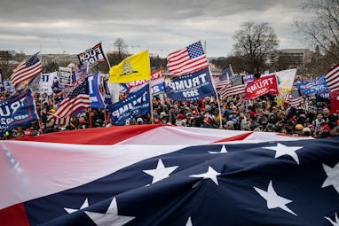WASHINGTON, DC - JANUARY 06: Protesters gather outside the U.S. Capitol Building on January 06, 2021...