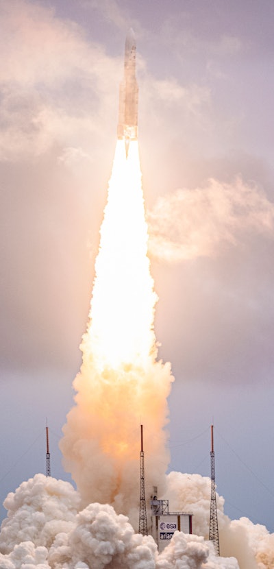 Arianespace's Ariane 5 rocket with NASAs James Webb Space Telescope onboard lifts up from the launch...