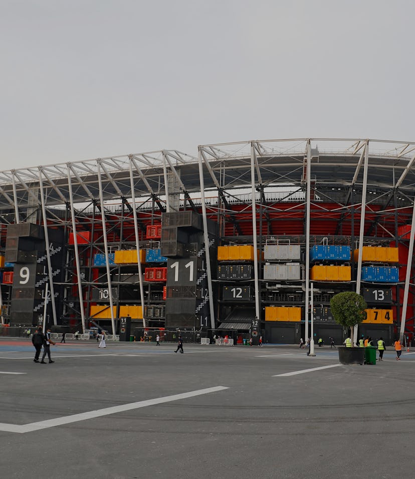 Fans arrive for the FIFA Arab Cup 2021 semi-final football match between Tunisia and Egypt at the 97...
