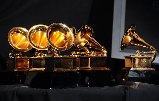 The six trophies for Adele are displayed backstage at the 54th Grammy Awards in Los Angeles, Califor...