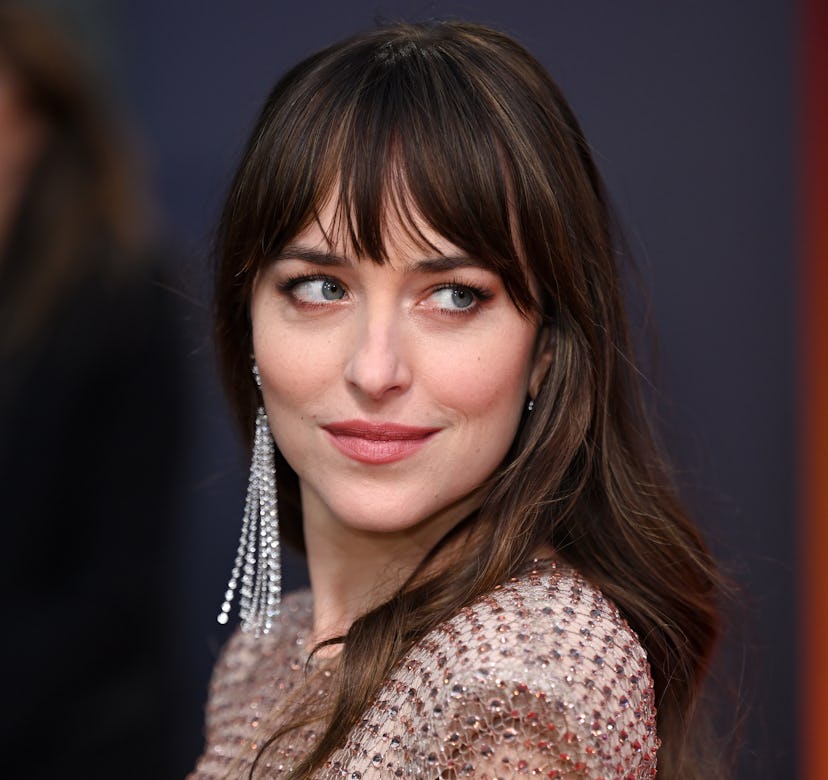 LONDON, ENGLAND - OCTOBER 13: Dakota Johnson attends "The Lost Daughter" UK Premiere during the 65th...