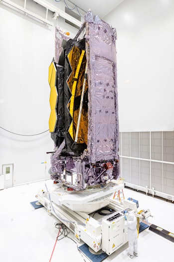 The James Webb Space Telescope stands in the S5 Payload Preparation Facility (EPCU-S5) at The Guiana...