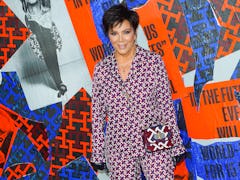 Kris Jenner is seen with her "tramp stamp" tattoo covered as she attends the Tommy Hilfiger Fall 22 ...