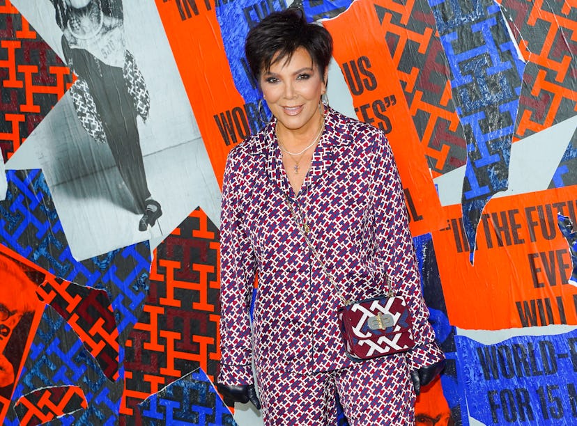 Kris Jenner is seen with her "tramp stamp" tattoo covered as she attends the Tommy Hilfiger Fall 22 ...