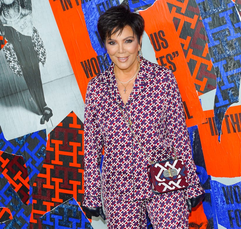 Kris Jenner is seen with her "tramp stamp" tattoo covered as she attends the Tommy Hilfiger Fall 22 ...