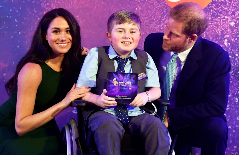 Prince Harry and Meghan Markle with William Magee at the 2019  WellChild Awards.