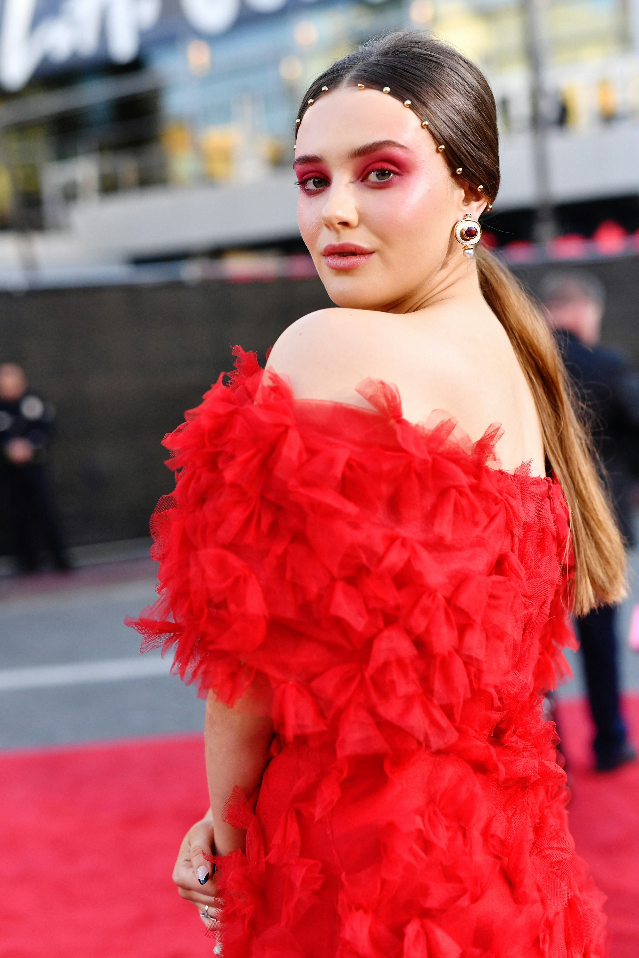 Katherine Langford rocks red eyeshadow to the 2019 American Music Awards.