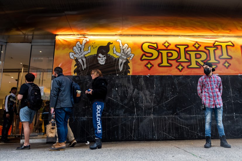 People waiting in line outside a Spirit Halloween store in New York City