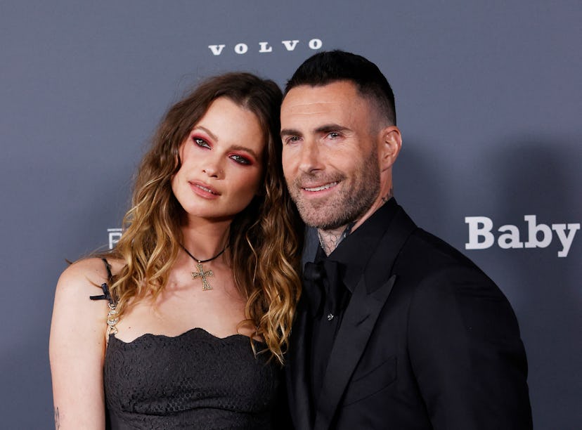 Adam Levine and Behati Prinsloo's beach body language was surprising.