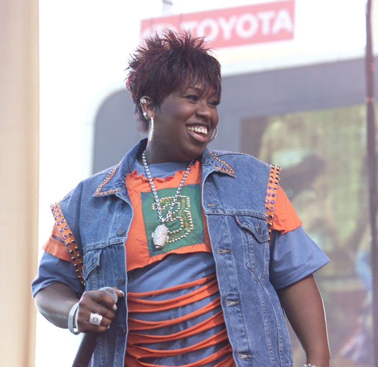 Y2K Halloween costume ideas include Missy Elliott in a denim vest and two t-shirts at Dodger Stadium...