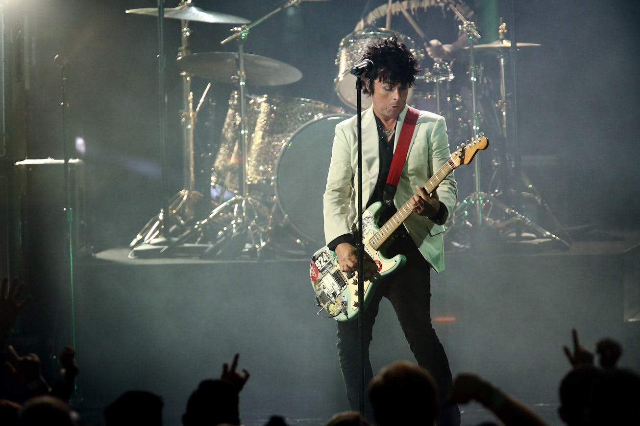 LOS ANGELES, CALIFORNIA - NOVEMBER 24: Billie Joe Armstrong of Green Day performs onstage during the...