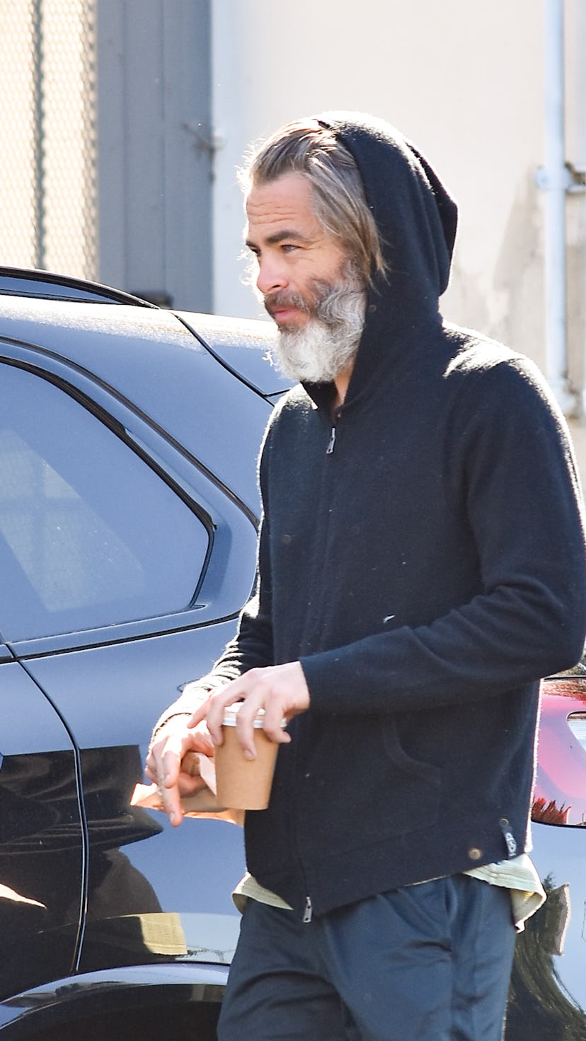 Middle-aged man wearing a black hoodie