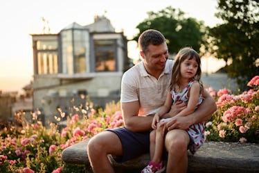 Father teaching Daughter to Stop Saying ‘I’m Sorry’ in front of a lake.