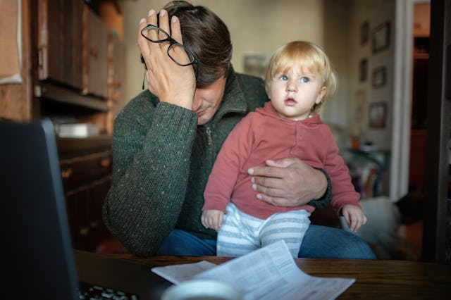 A frustrated father holding his son. New research coming out of King's College London is pointing to...