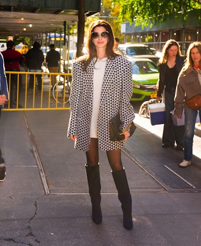 Anne Hathaway wearing an oversize printed blazer.
