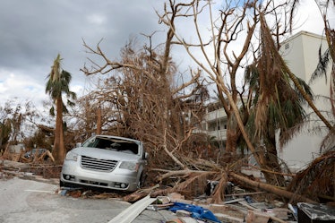 SANIBEL, FLORIDA - OCTOBER 08: A destroyed vehicle lays among debris after Hurricane Ian passed thro...
