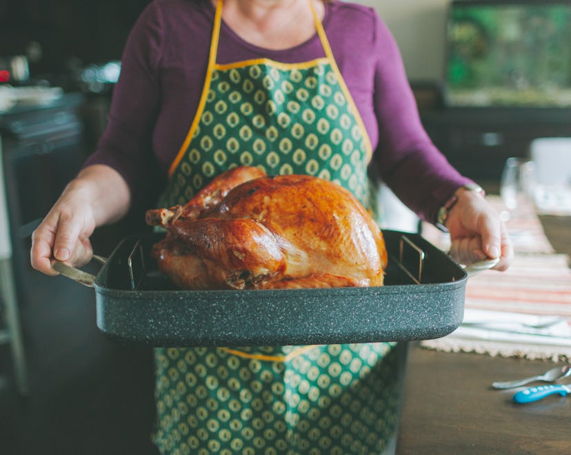 Thanksgiving turkey coming out of the oven