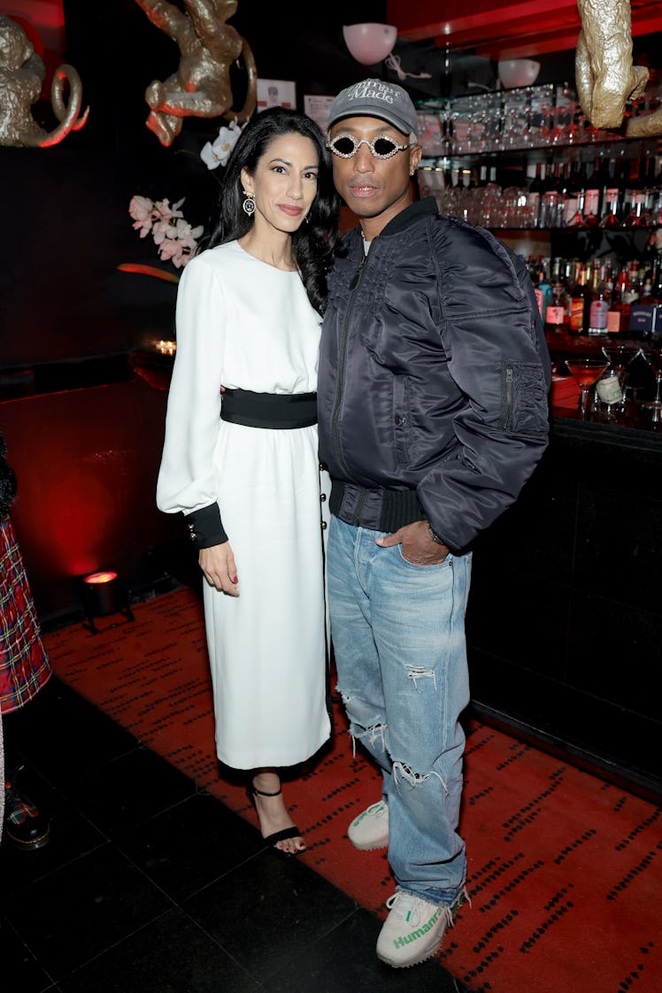 NEW YORK, NEW YORK - OCTOBER 12: Huma Abedin and Pharrell Williams attend W Magazine 50th Anniversar...