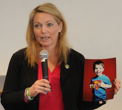 Nicole Hockley, Founder and Managing Director of Sandy Hook Promise displays a photo of her late son...