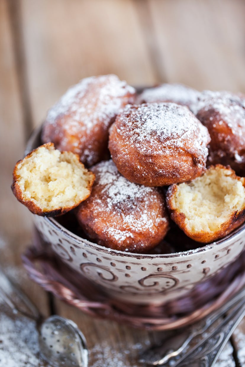 Fresh delicious homemade warm apple fritters in bowl
