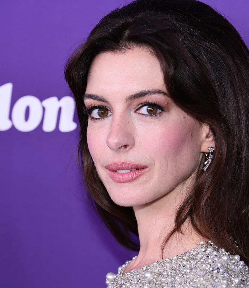 NEW YORK, NEW YORK - OCTOBER 12: Anne Hathaway attends the red carpet event for "Armageddon Time" du...