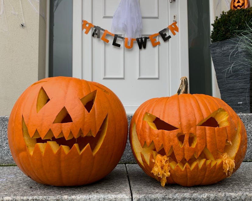 Front porch steps with carved festive pumpkins, demonstrating how to make your carved pumpkin last l...