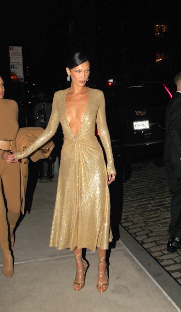 Bella Hadid Goes Glam In Golden Gown With Plunging V-Neckline