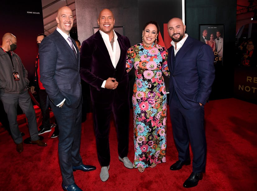 Hiram Garcia, Dwayne Johnson, Dany Garcia, and Dave Rienzi at the premiere of Netflix’s Red Notice. ...