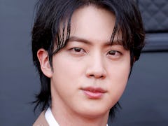 Fans think BTS' Jin collaborated with Coldplay's Chris Martin on his debut solo single "The Astronau...
