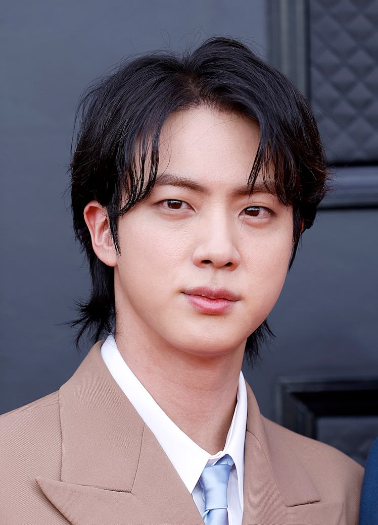 Fans think BTS' Jin collaborated with Coldplay's Chris Martin on his debut solo single "The Astronau...