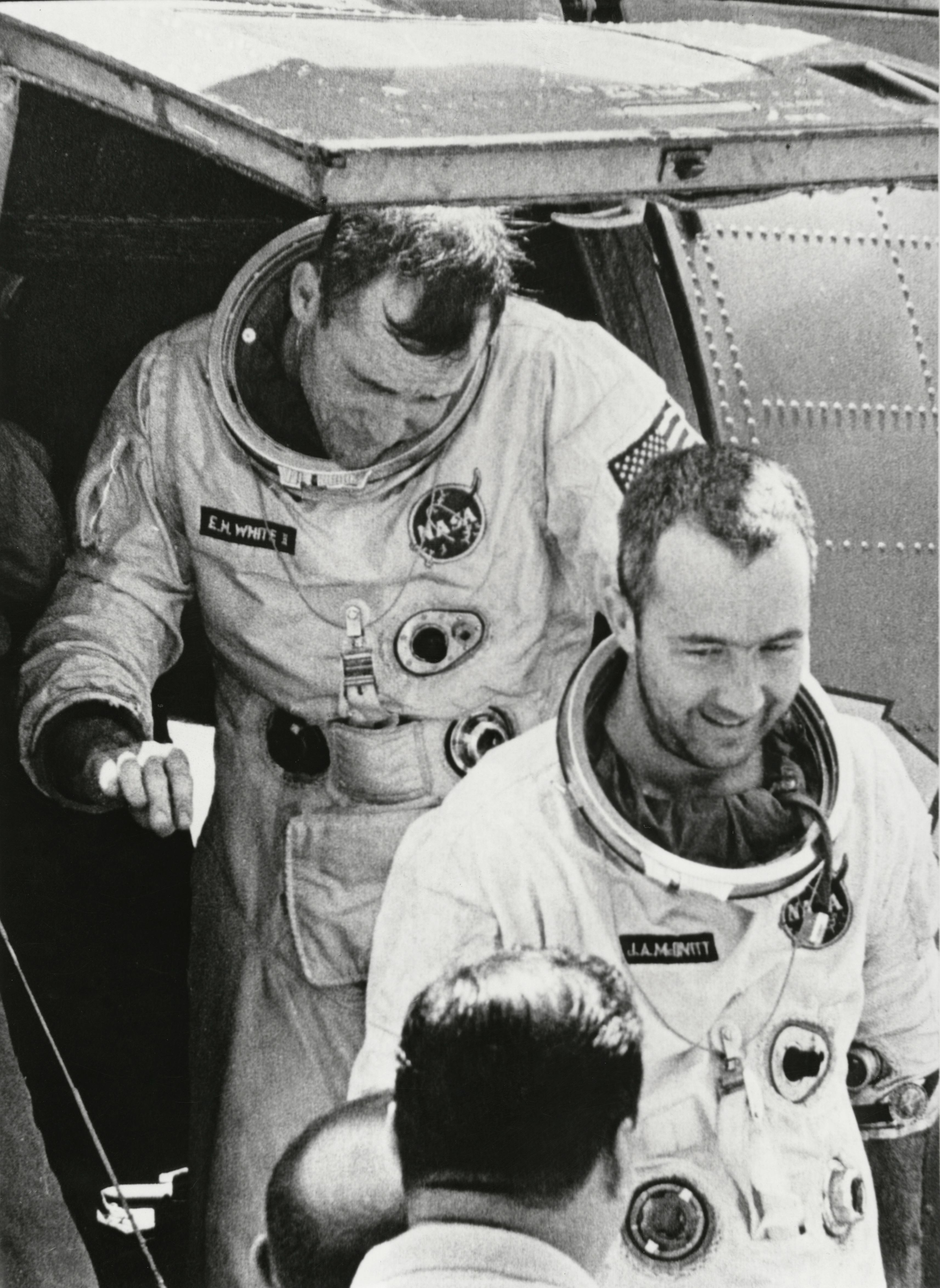 NASA Astronauts James McDivitt (front) and Edward White II Exiting Helicopter after Being Rescued fr...