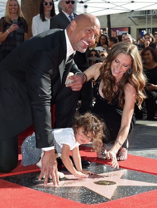 HOLLYWOOD, CA - DECEMBER 13: Actor Dwayne Johnson, wife Lauren Hashian and daughter Jasmine Johnson…