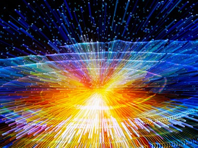 Data points explode in a colorful zoom effect in an image about innovation, big data, and growth.