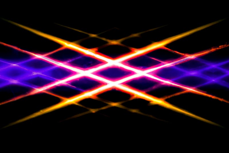 abstract background with neon lights on black background