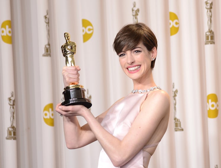 HOLLYWOOD, CA - FEBRUARY 24: Actress Anne Hathaway, winner of the Best Supporting Actress award for...